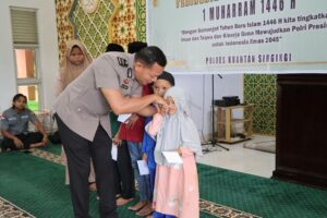 Polres Kuansing Gelar Doa Bersama dan Santunan Anak Yatim Peringati Tahun Baru Islam 1 Muharram 1446 H