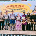 Bupati Kuantan Singingi, Suhardiman Amby, secara resmi membuka acara launching buku "Bunda Literasi Kuansing: Kisah Imam"