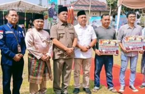Bupati Kuansing Drs. H. Suhardiman Amby resmi membuka Festival pacu jalur tepian H. Saidina Ali