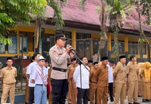 Polres Kuansing Sosialisasikan Penerimaan Terpadu Calon Anggota Polri 2025 di SMK Negeri 2 Taluk Kuantan